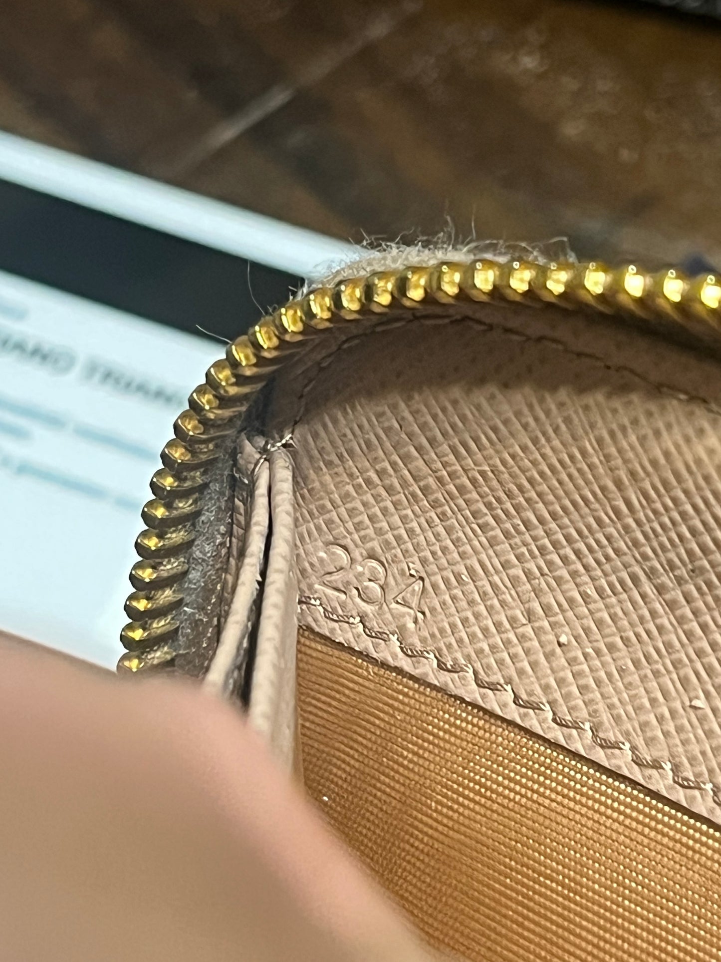 Prada Saffiano Triang Zip Wallet