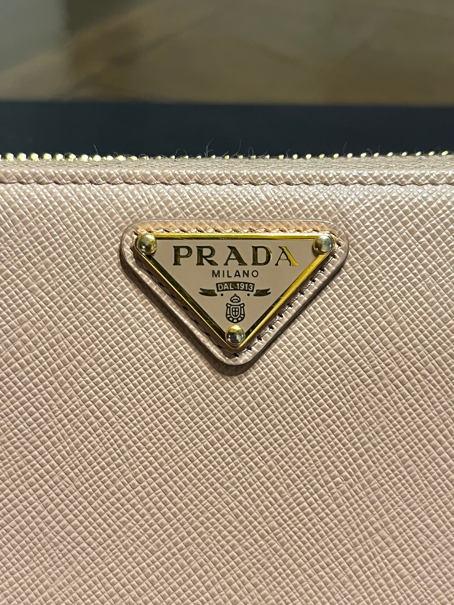 Prada Saffiano Triang Zip Wallet
